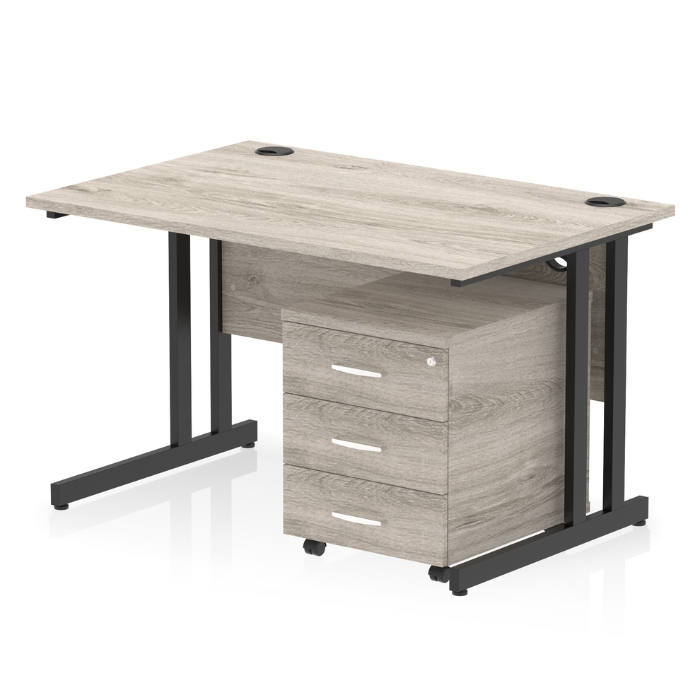 Grey oak straight desk with drawers on a white background