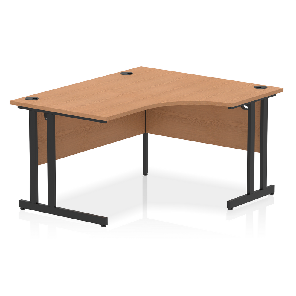 Oak L-shaped desk with drawers on a white background