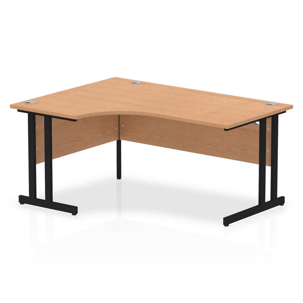 Oak L-shaped desk with drawers on a white background