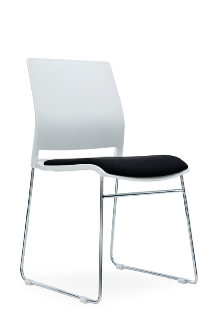 A white stacking chair with a black fabric seat pad and a chrome metal frame.