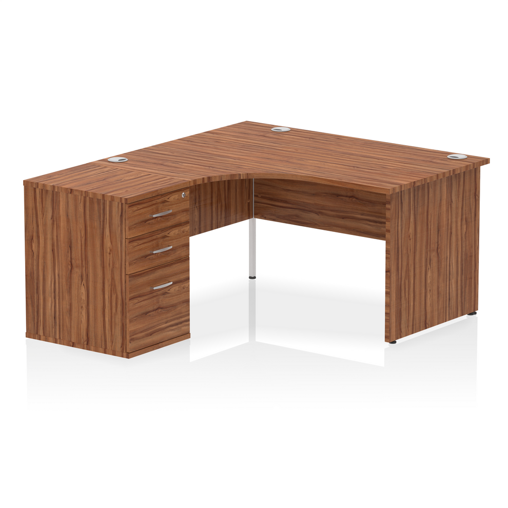 Walnut L-shaped desk with drawers on a white background
