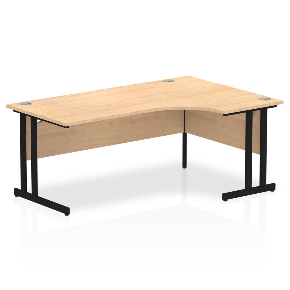Maple L-shaped desk with drawers on a white background