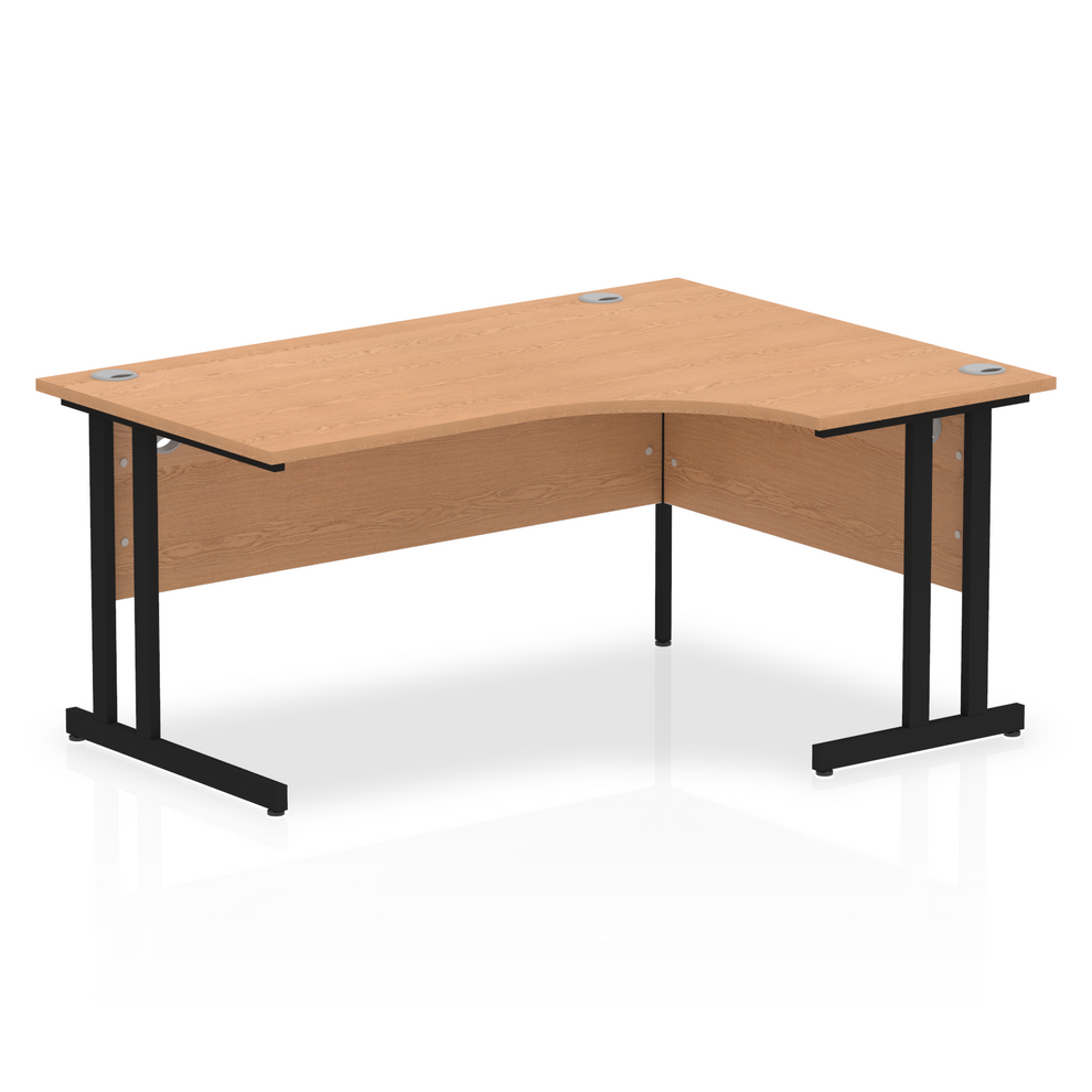 Oak L-shaped desk with drawers on a white background