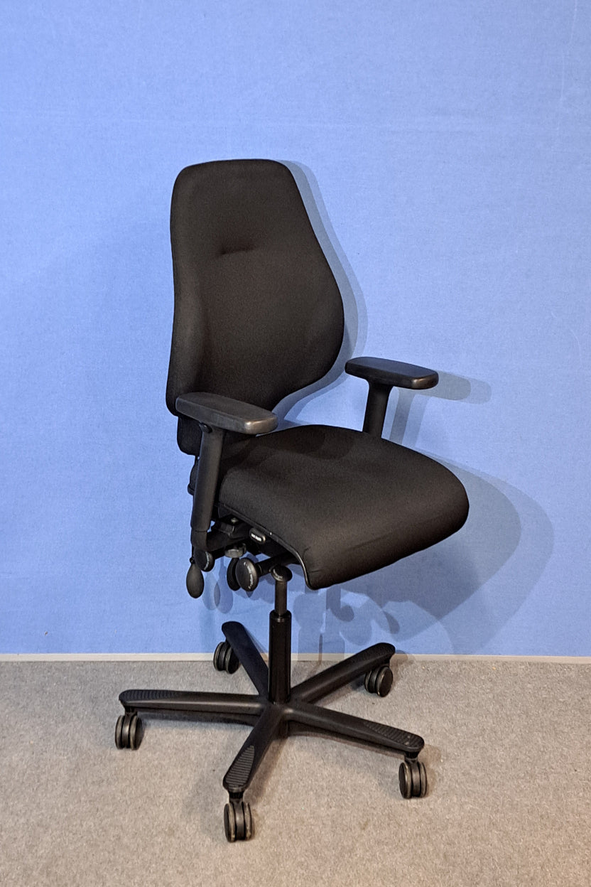 Black office chair with armrests on a blue and gray background