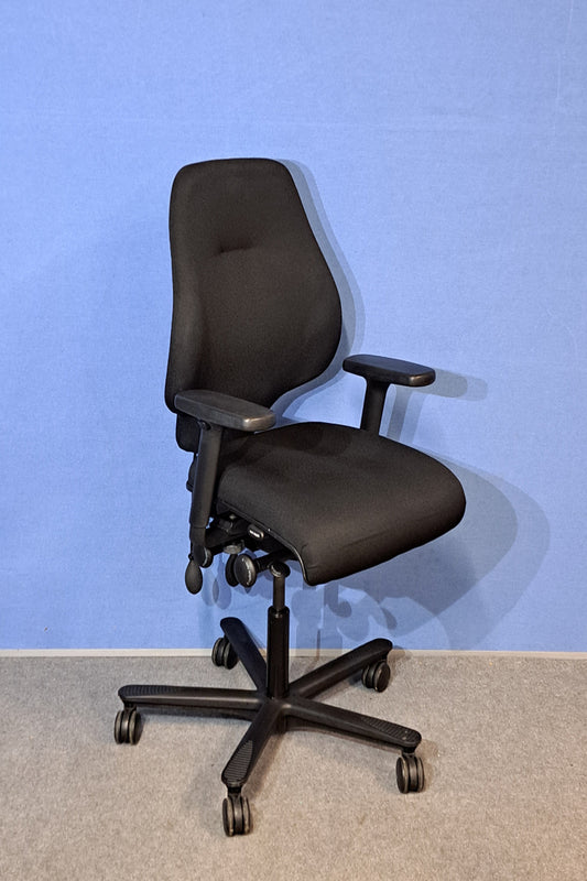 Black office chair with armrests on a blue and gray background