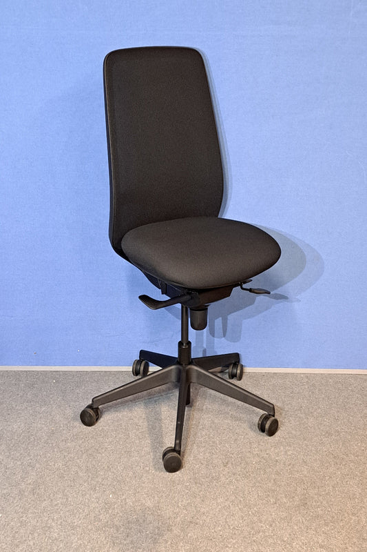 Black office chair on a blue and grey floor