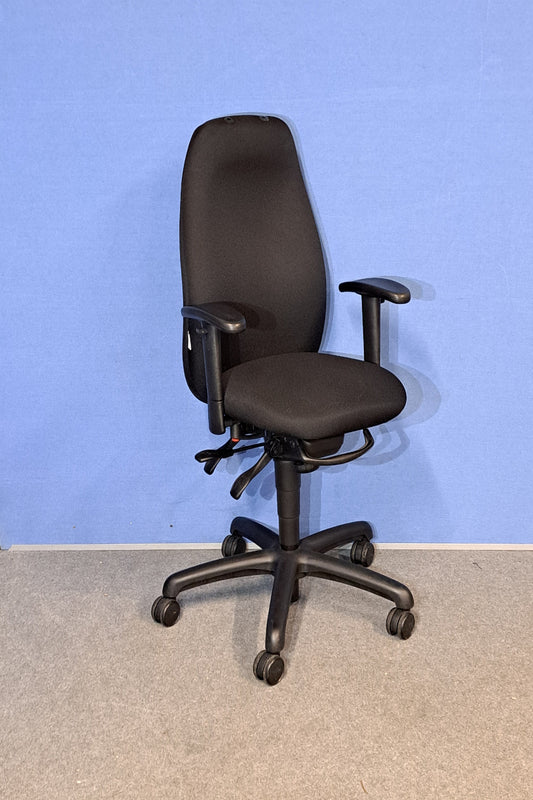 Black office chair on a blue and grey floor