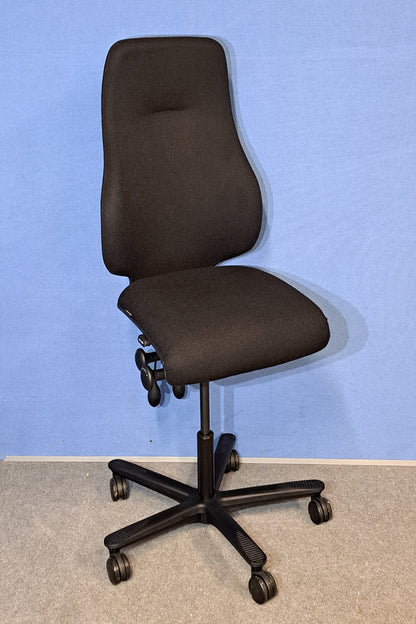 Ergonomic office chair on a blue and grey background