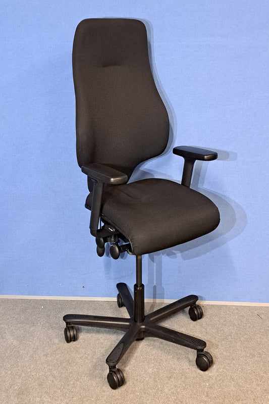 Black office chair on a blue and grey floor.