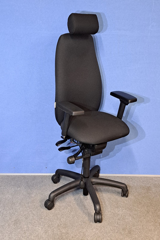 Black office chair on a blue and grey floor