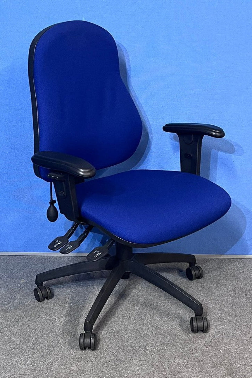 Blue office chair with black base on a gray floor against a blue wall