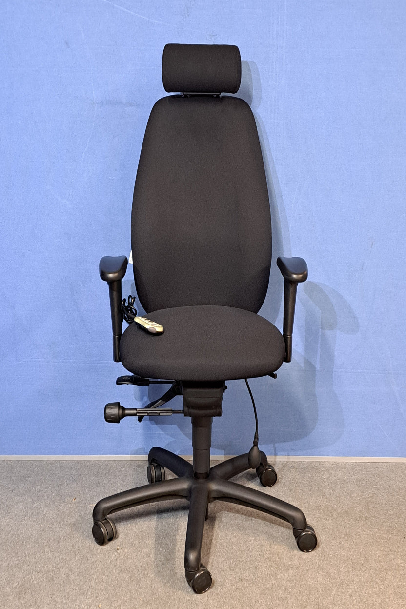 Black office chair on a blue and grey floor