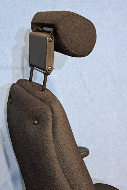 Black headrest on a light blue background