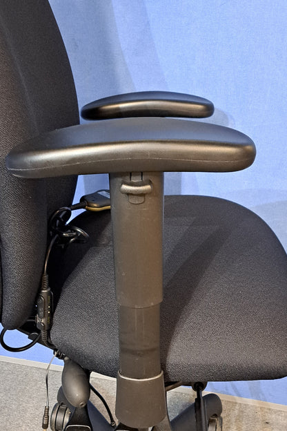 Close-up of a set of arms on a chair