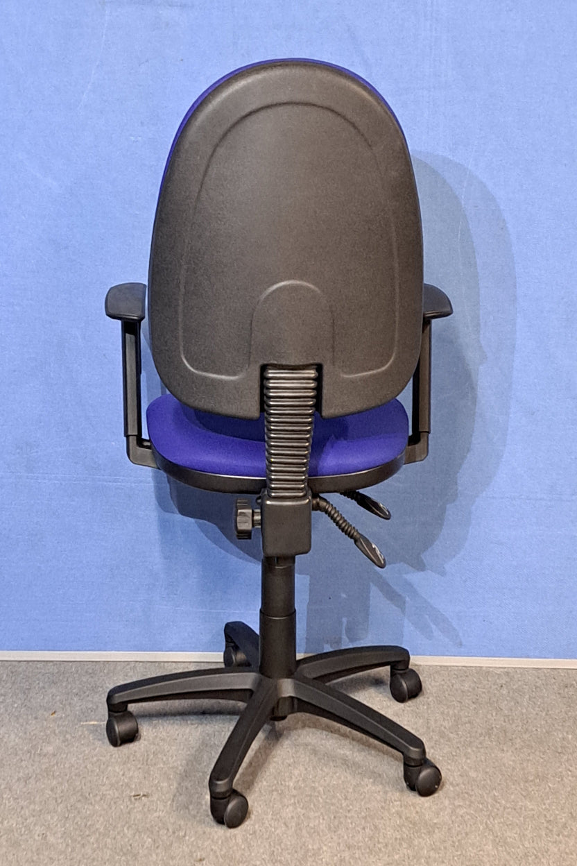 Blue office chair on a blue background and grey floor.