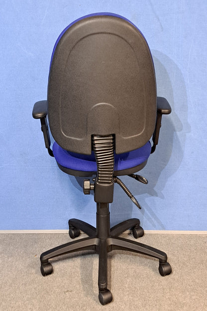 Blue office chair on a blue background  and grey floor