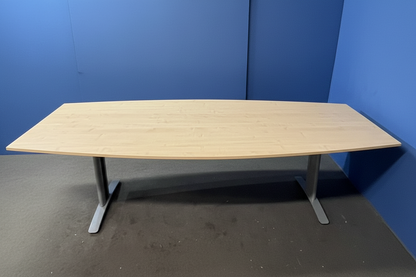 Wooden desk against a blue wall