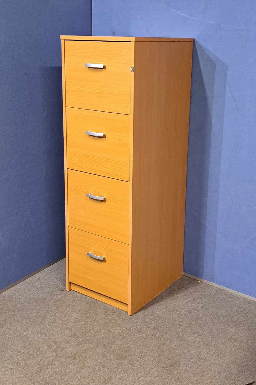 Beech filing cabinet on a blue a wall and grey carpet