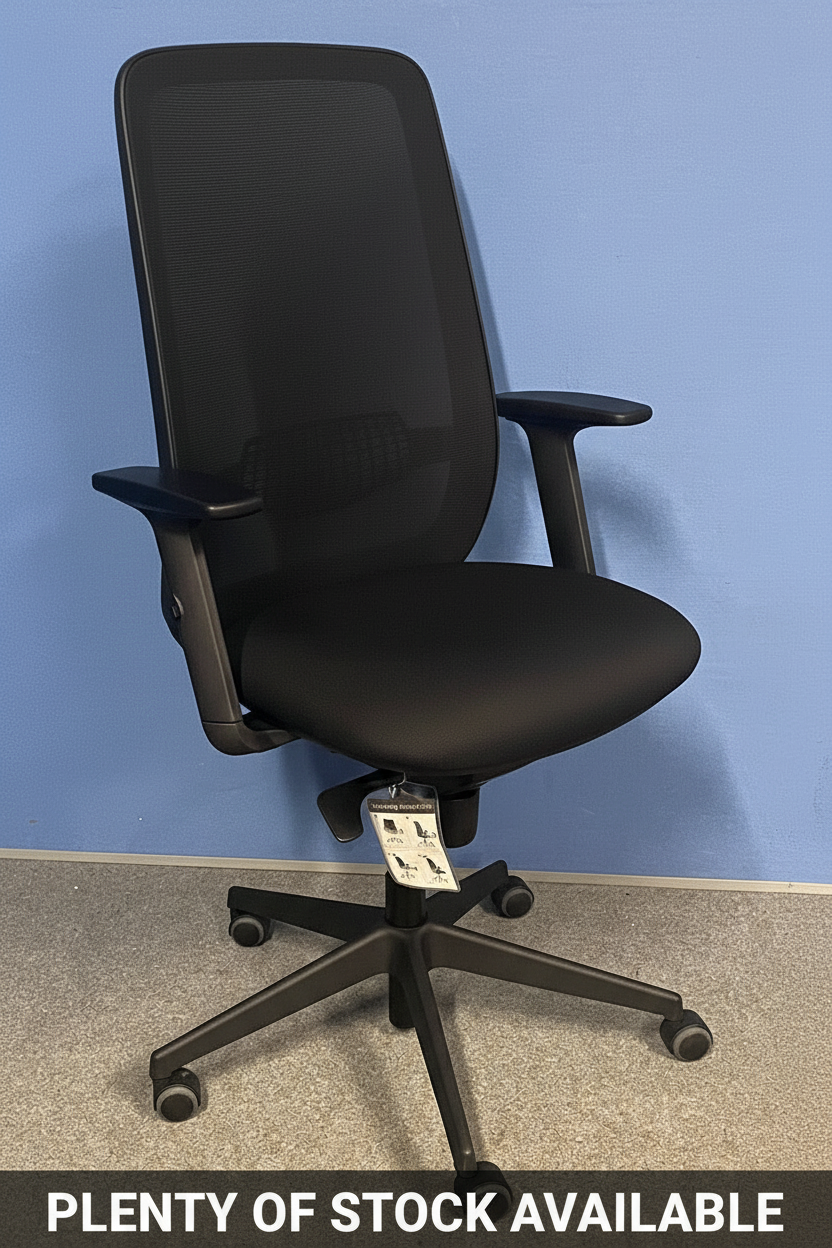 Black office chair on a blue wall background