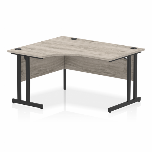 Impulse 1400mm Left Hand Curved Desk with Black Cantilever Legs Grey Oak Ref MI003347 OE