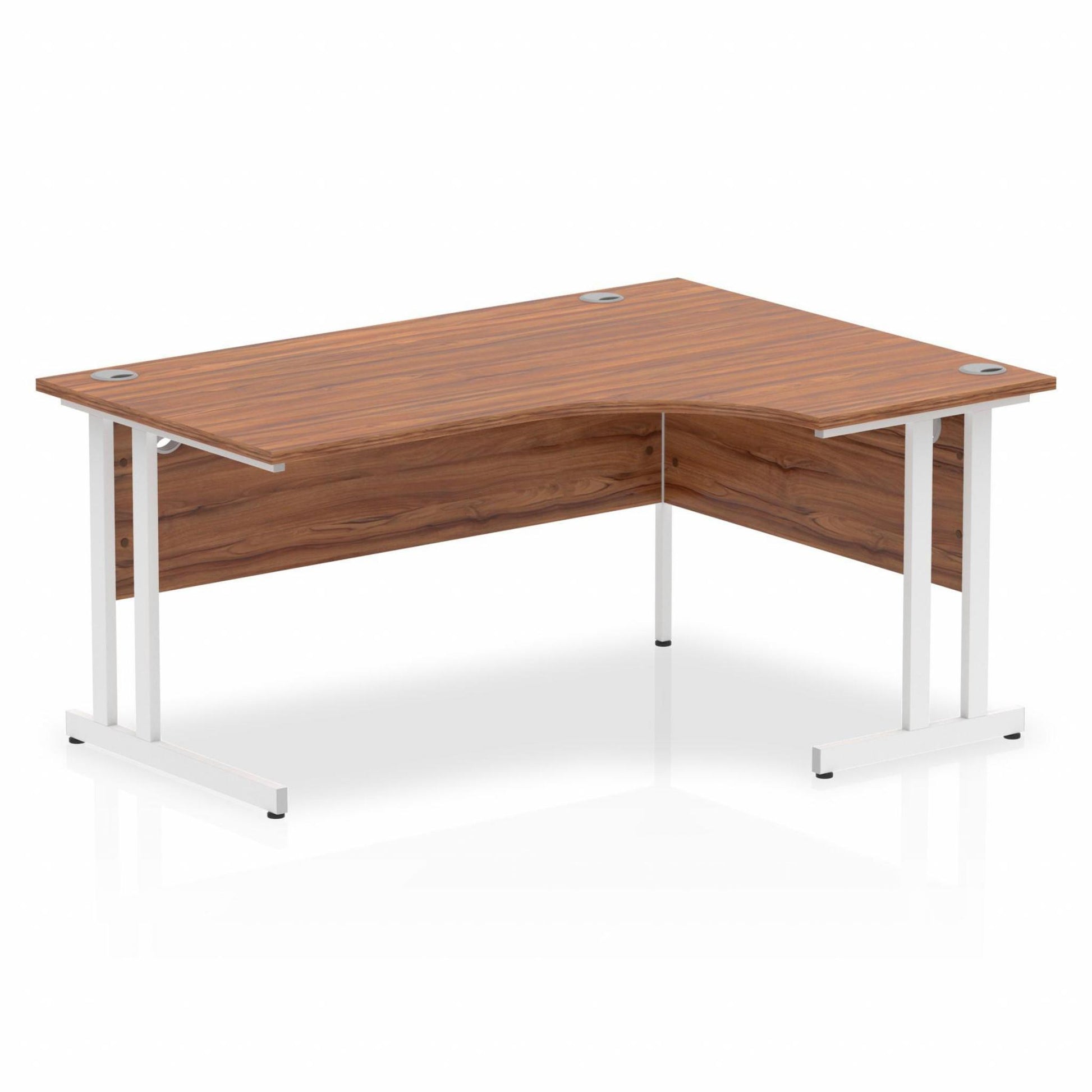 Walnut L-shaped desk with drawers on a white background