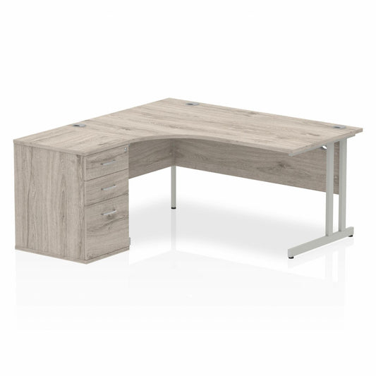 Impulse 1600mm Left Hand Curved Desk, Grey Oak Top with Silver Cantilver Legs inc 3 Drawer Desk High Pedestal