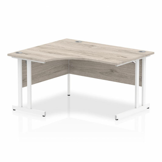 Impulse 1400mm Left Hand Curved Desk with White Cantilever Legs Grey Oak Ref I003831 OE