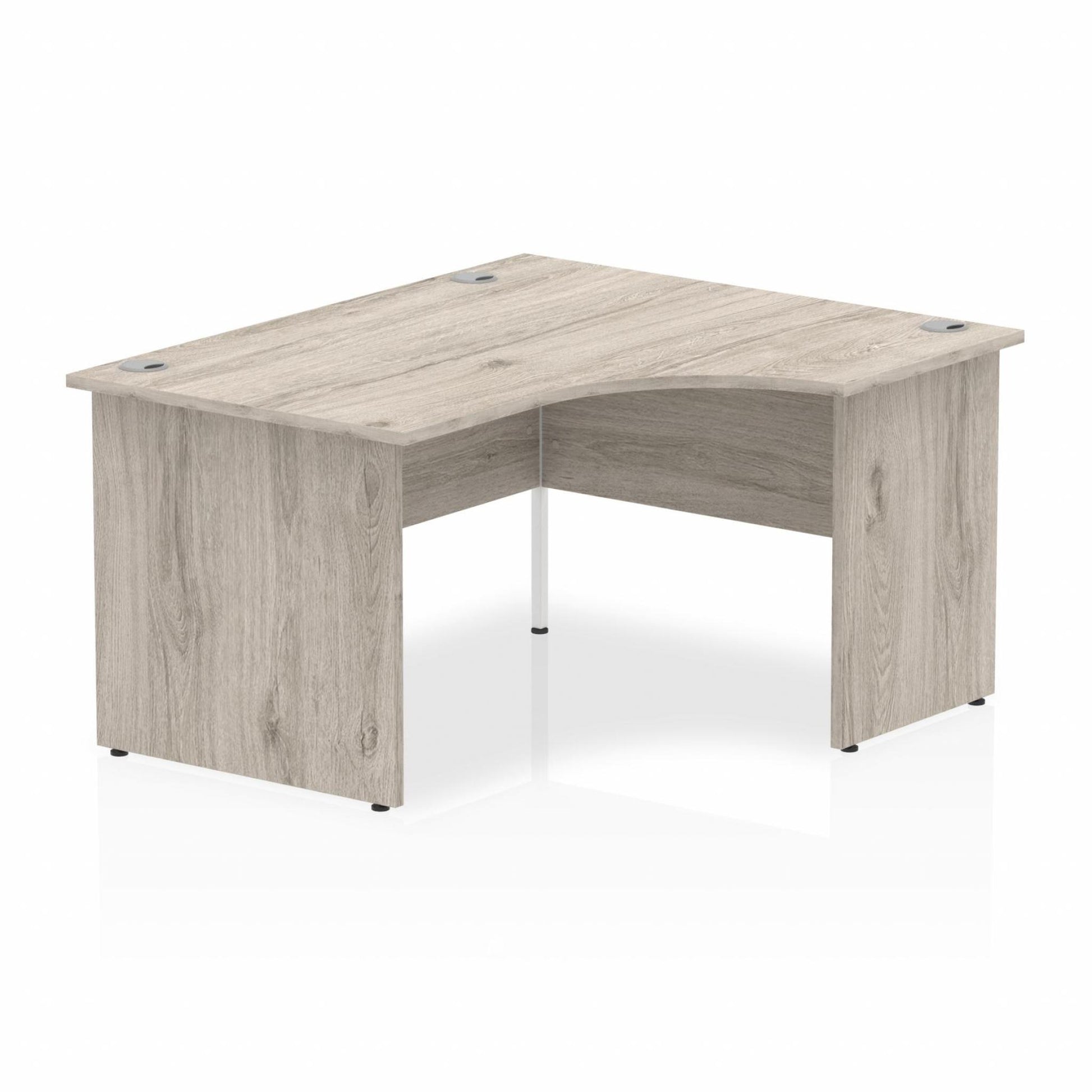 Grey oak L-shaped desk with drawers on a white background