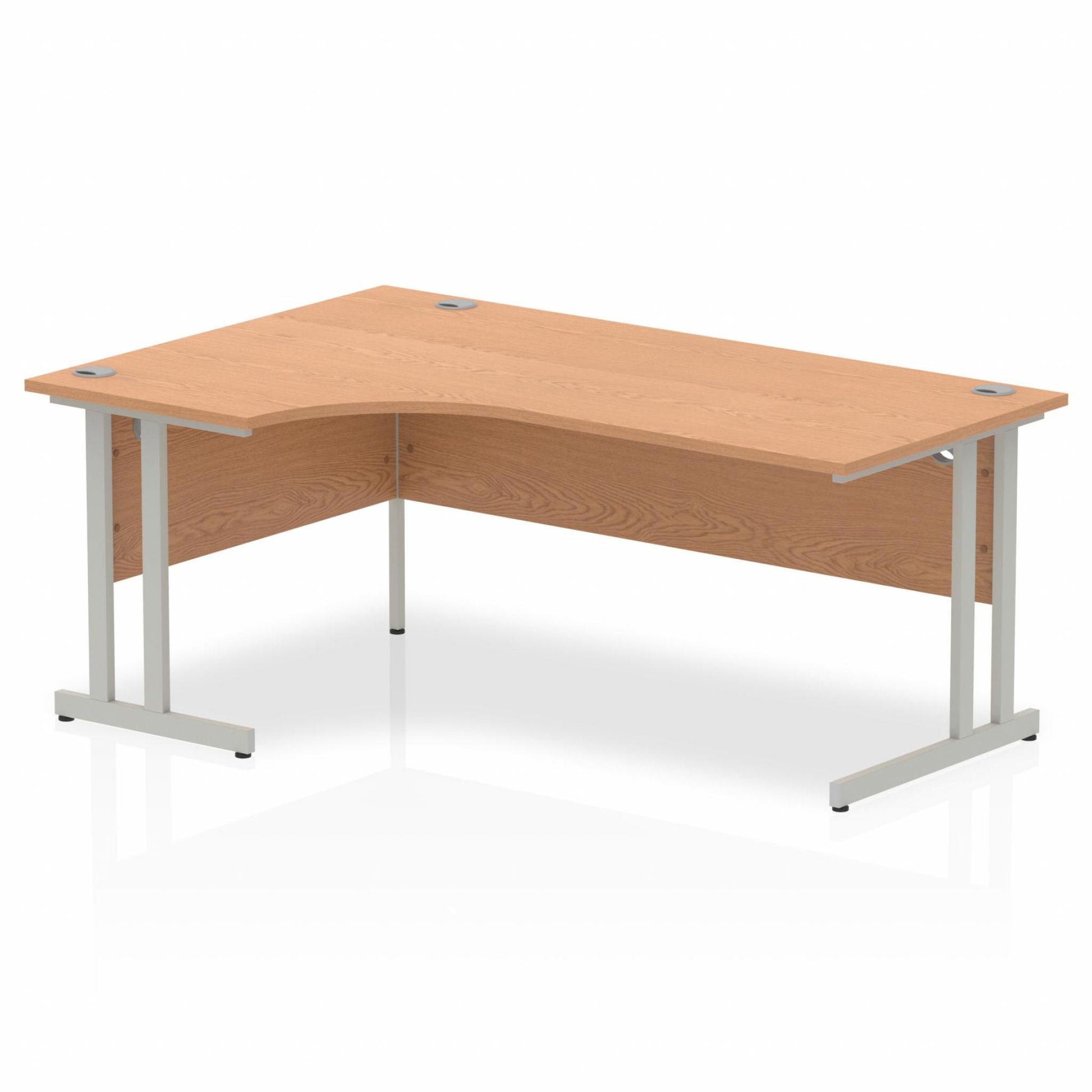 Oak L-shaped desk with drawers on a white background