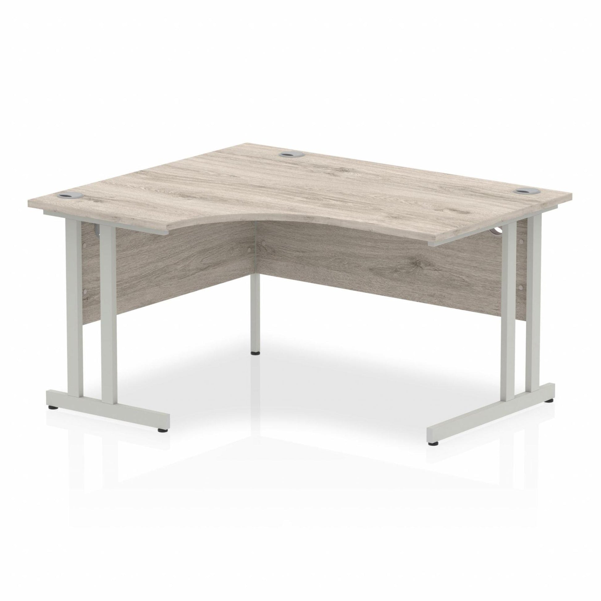 Grey oak L-shaped desk with drawers on a white background