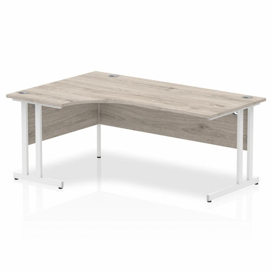 Impulse 1800mm Left Hand Curved Desk with White Cantilever Legs Grey Oak Ref I003528 OE