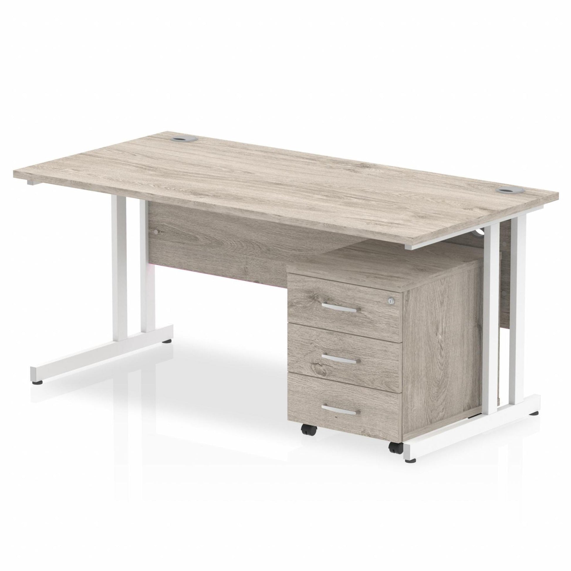 Grey oak straight desk with drawers on a white background