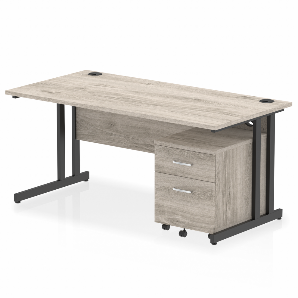 Grey oak straight desk with drawers on a white background