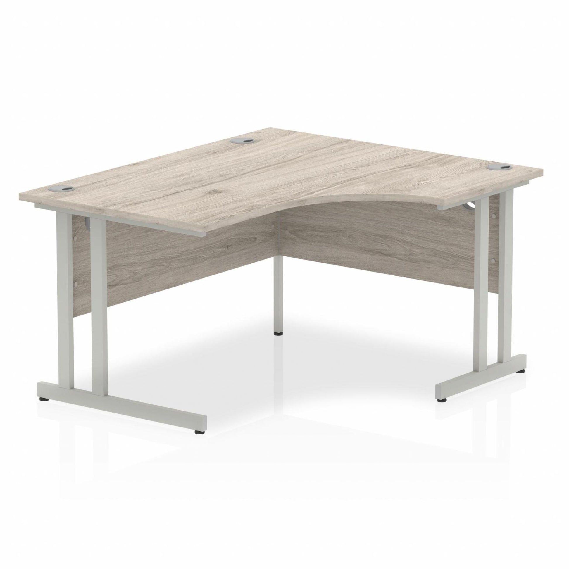 Grey oak L-shaped desk with drawers on a white background