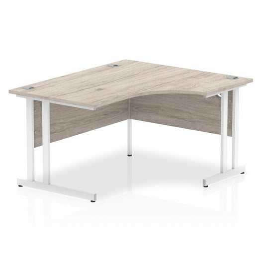 Impulse 1400mm Right Hand Curved Desk with White Cantilever Legs Grey Oak Ref I003837 OE