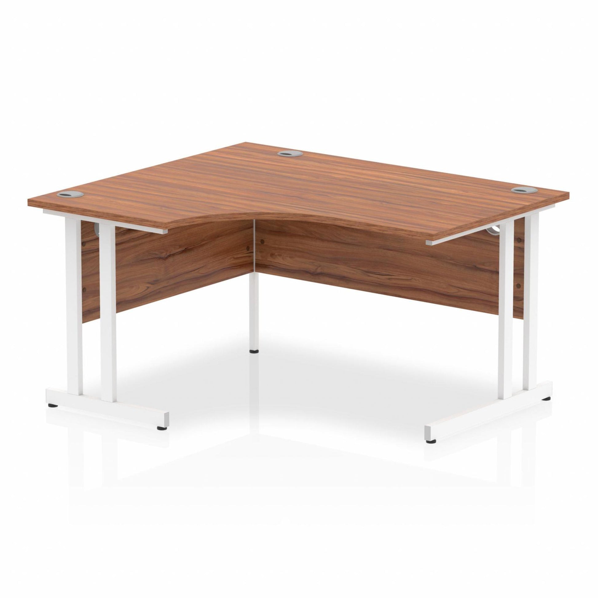 Walnut L-shaped desk with drawers on a white background