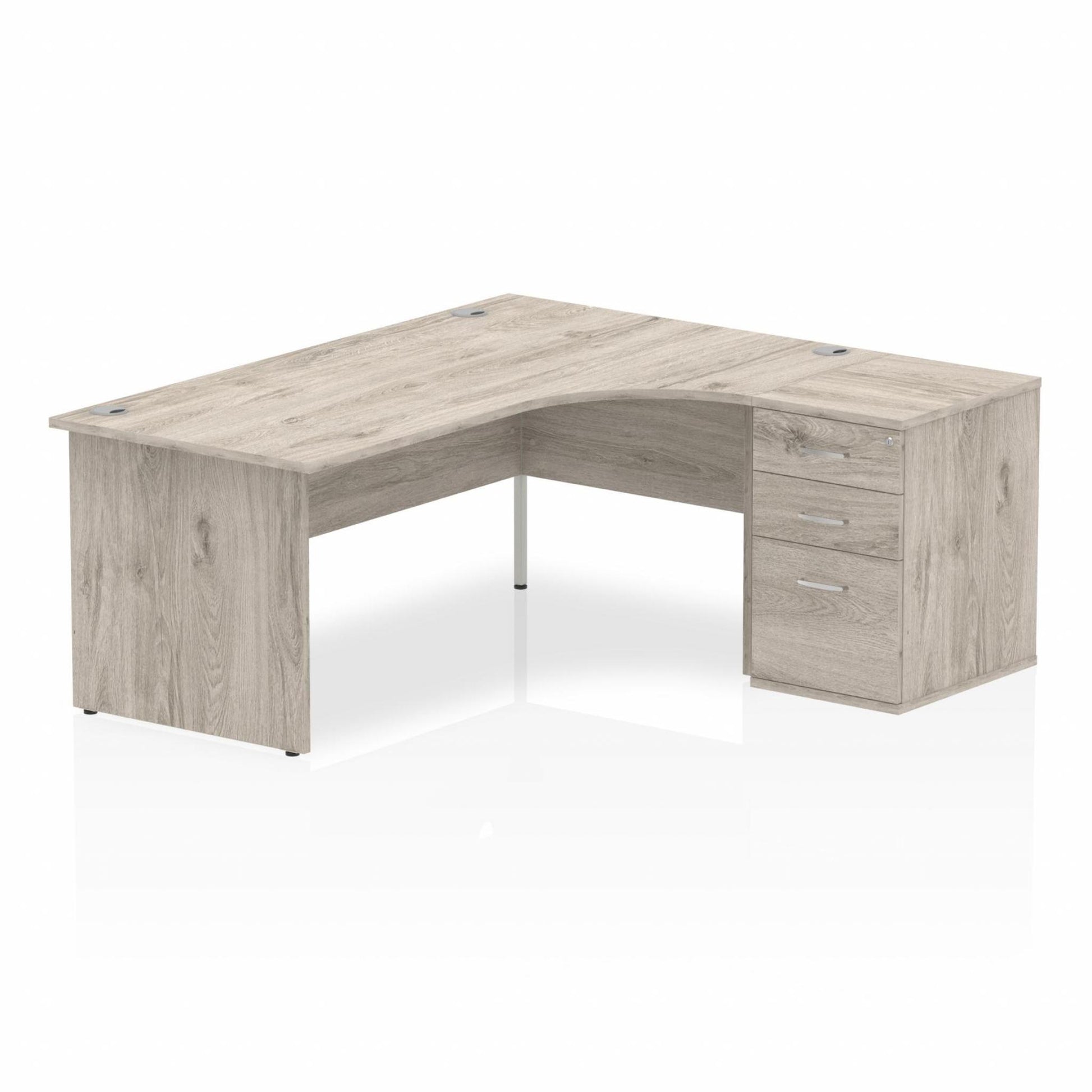 Grey oak L-shaped desk with drawers on a white background